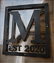 Metal business monogram sign